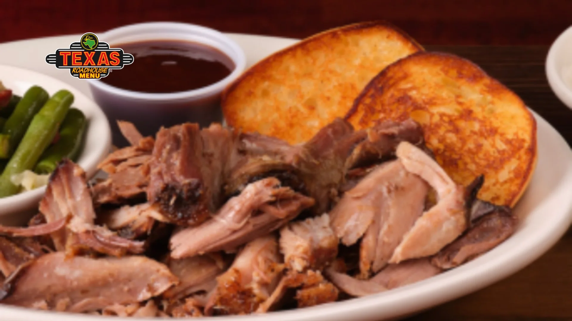 Pulled Pork Dinner served with sauce, salad and baked bread