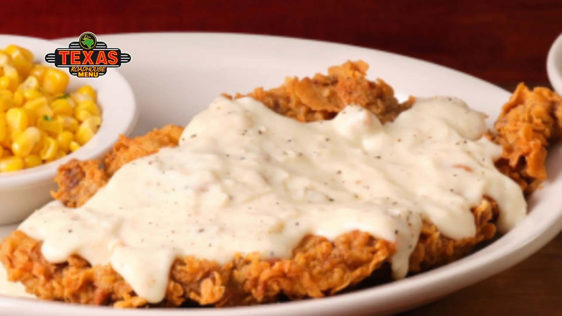 Country Fried Sirloin served with corns and topping with cream gravy