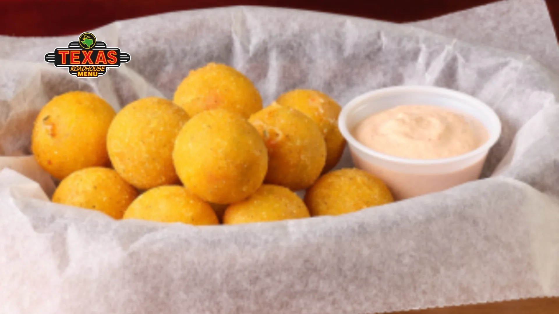 Rattlesnake Bites in a basket with sauce