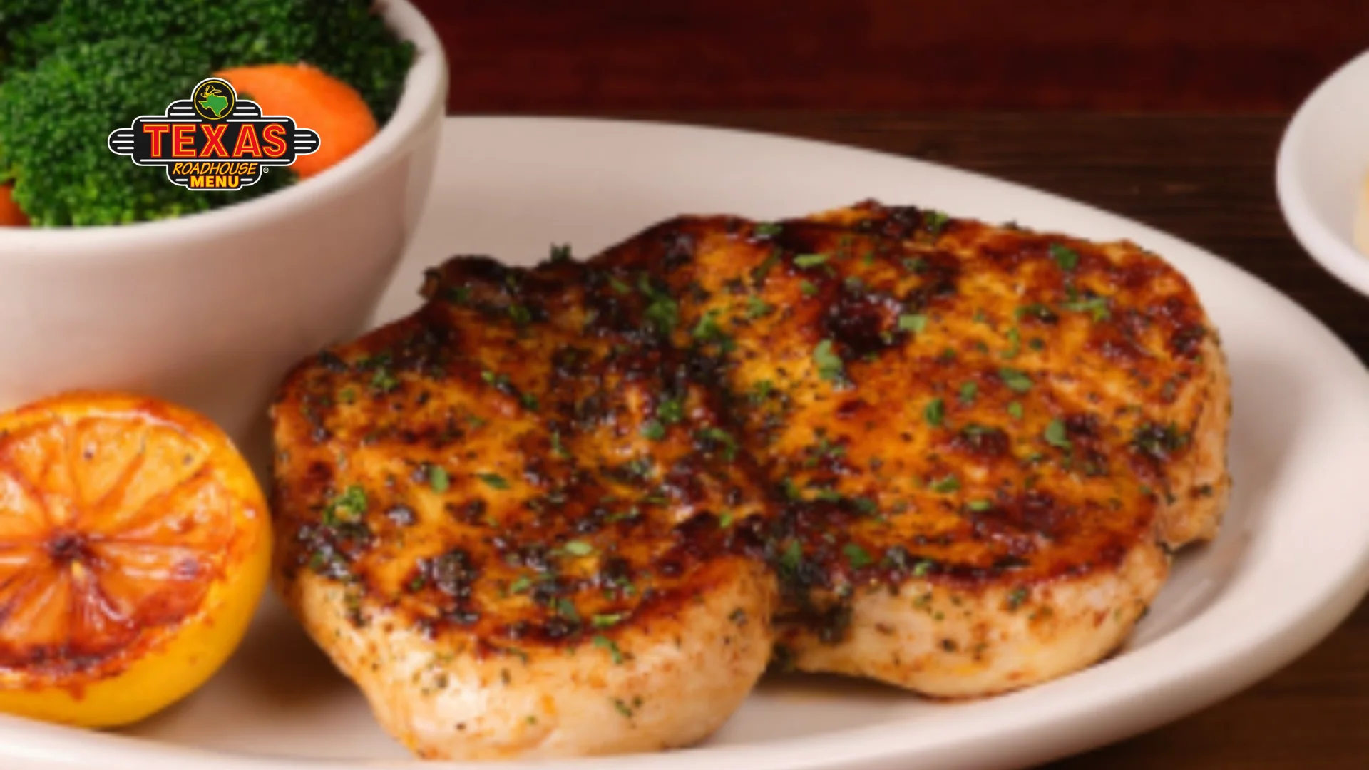Herb Crusted Chicken served with lemon sauces, salad and topping