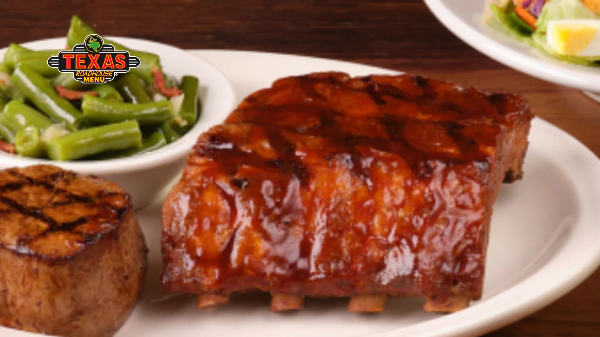 Filet* 6oz & Ribs served with salad