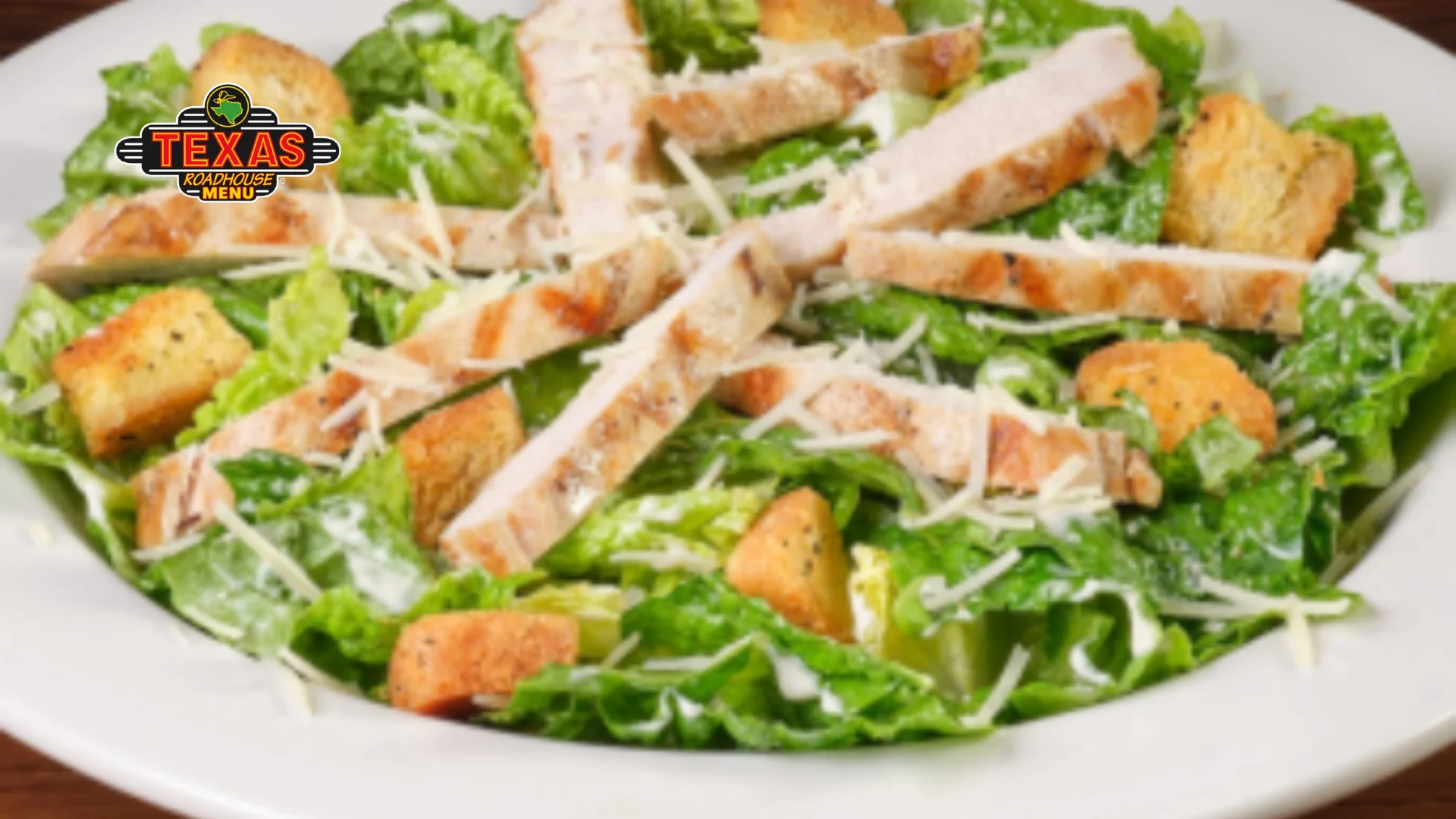 Chicken Caesar Salad served with green salad.